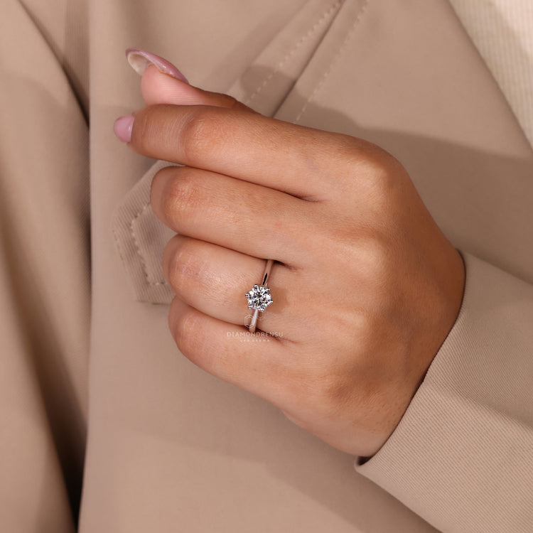 Hidden blue diamond ring crafted in white gold by Diamondrensu UK.
