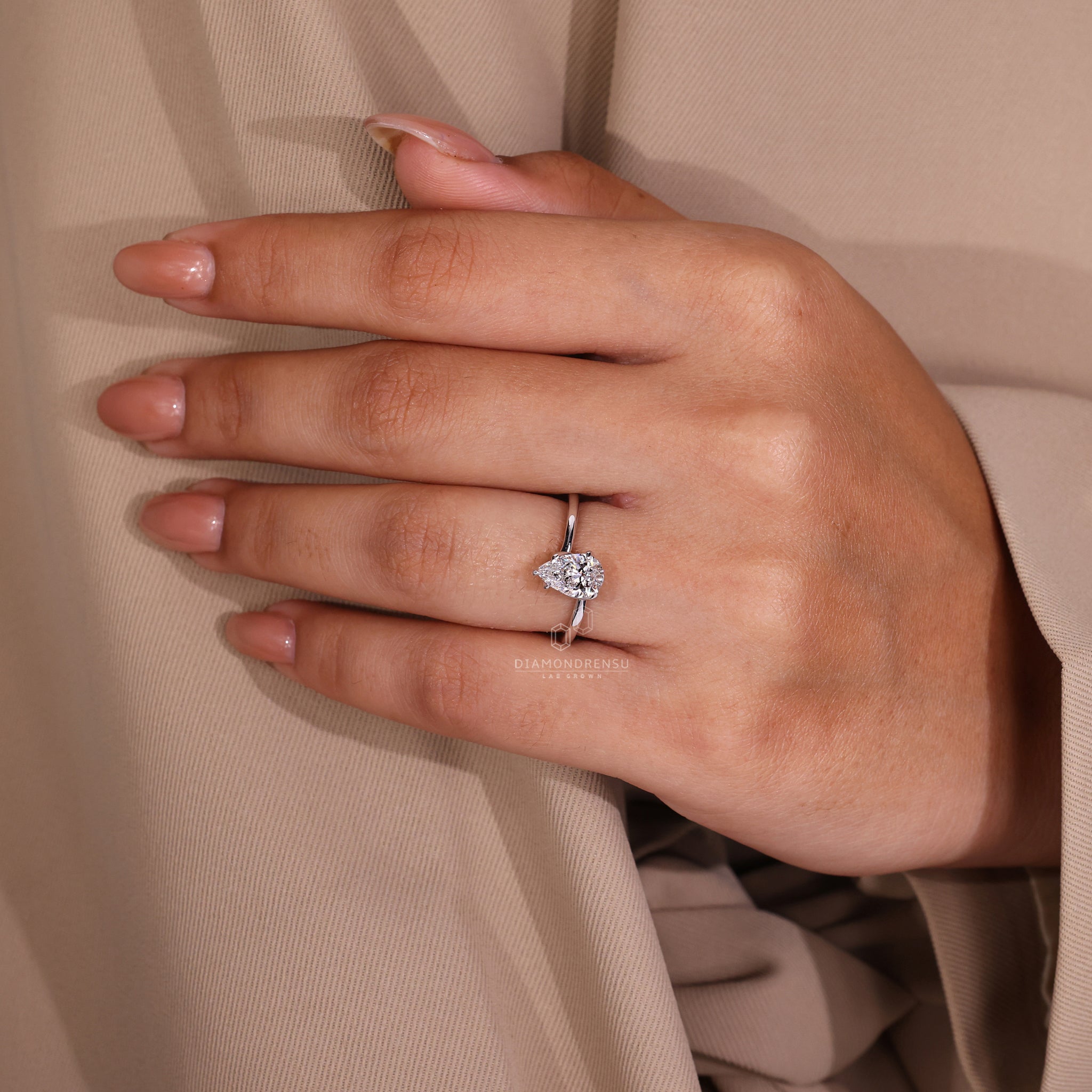 UK engagement ring in a unique twisted prong style.
