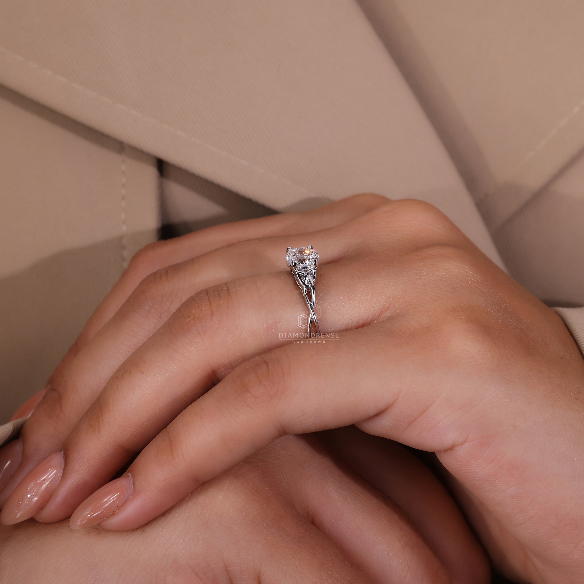 Twisted shank engagement ring crafted in white gold.
