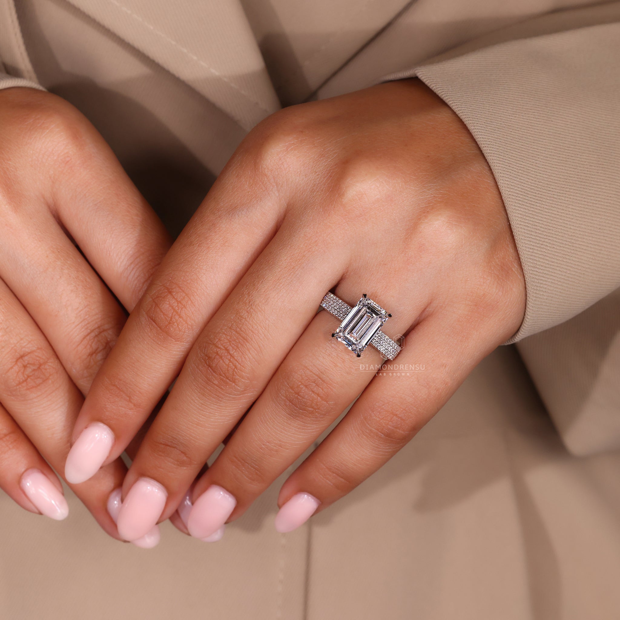 Diamondrensu UK engagement ring with hidden halo and two tone band.
