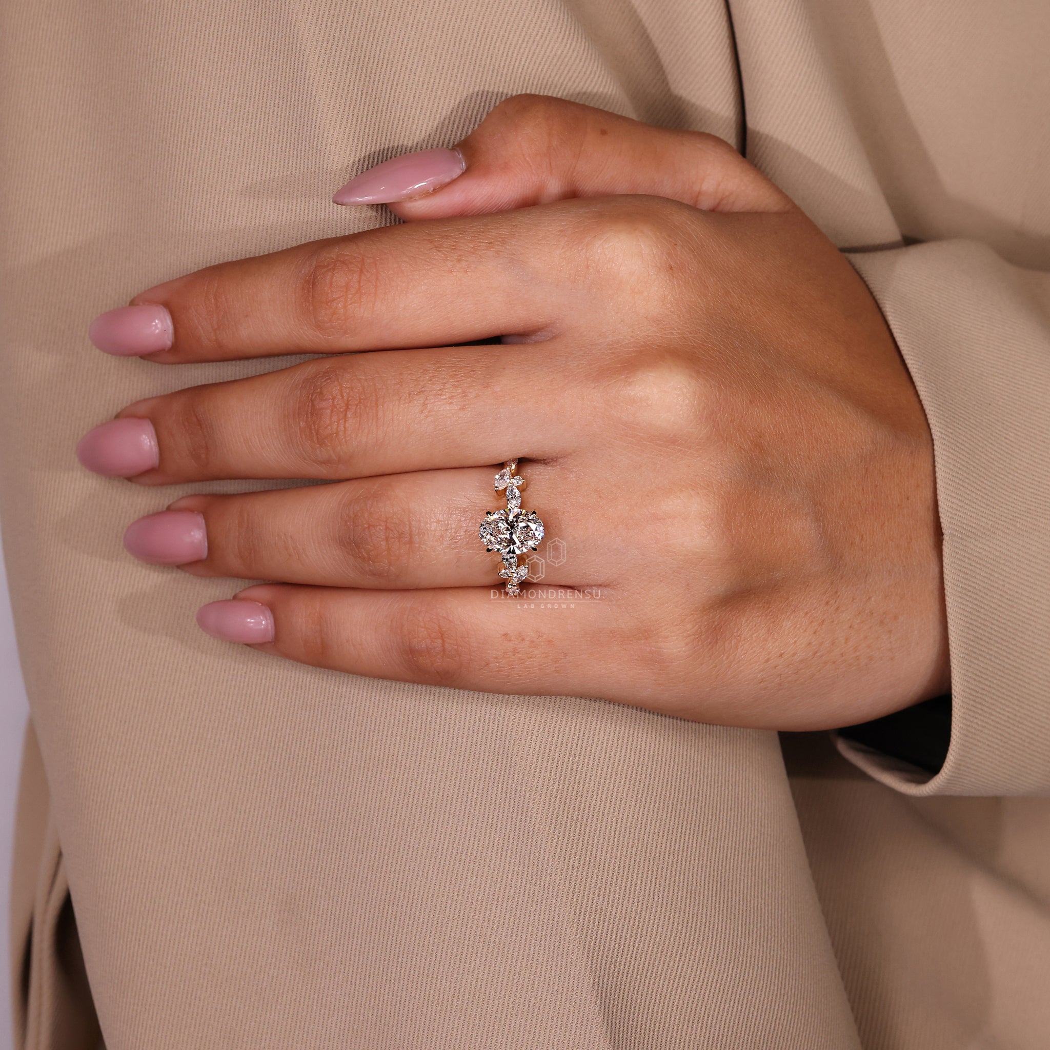 Side stone marquise diamond ring with oval engagement ring

