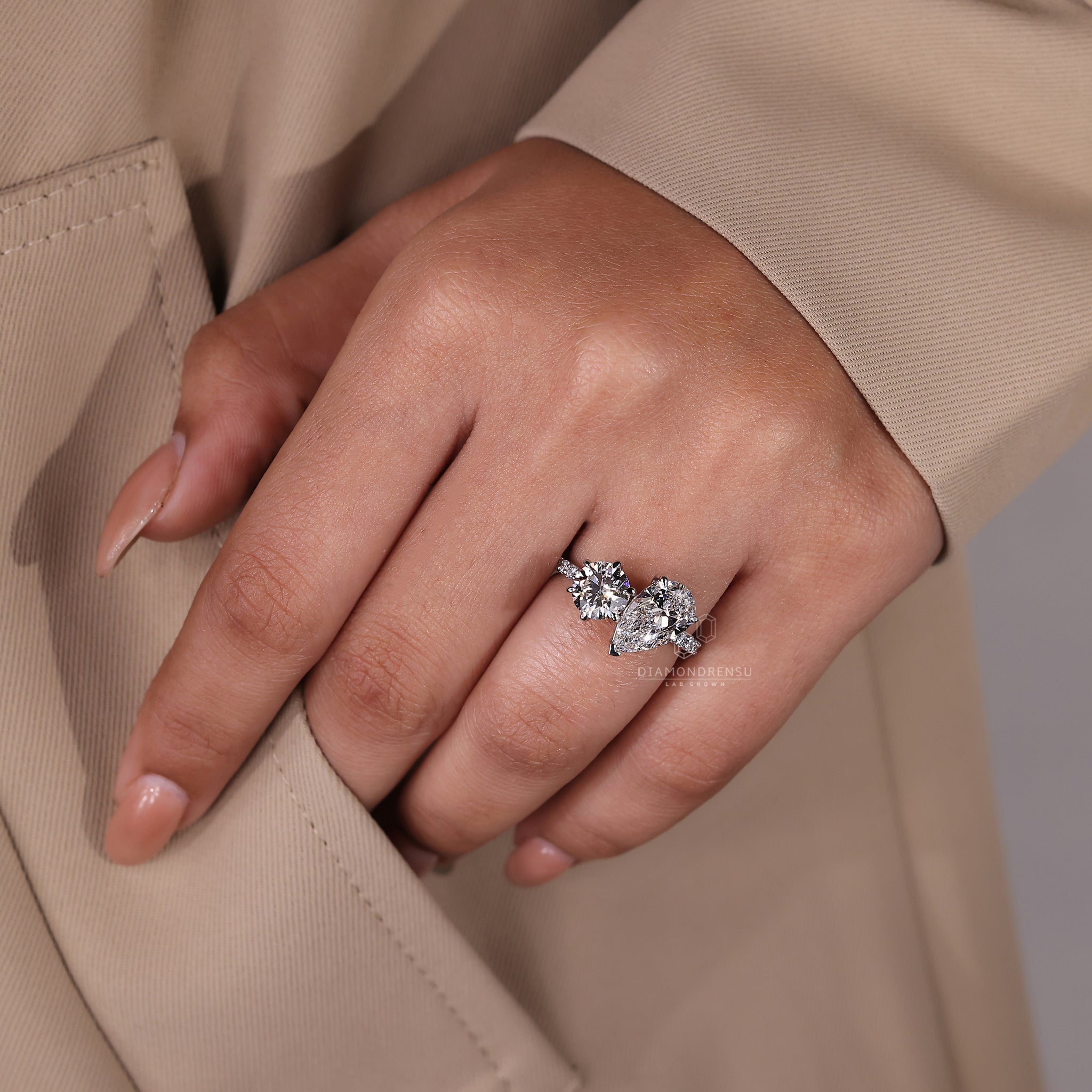 Lab grown diamond pave setting ring with claw prong detail.
