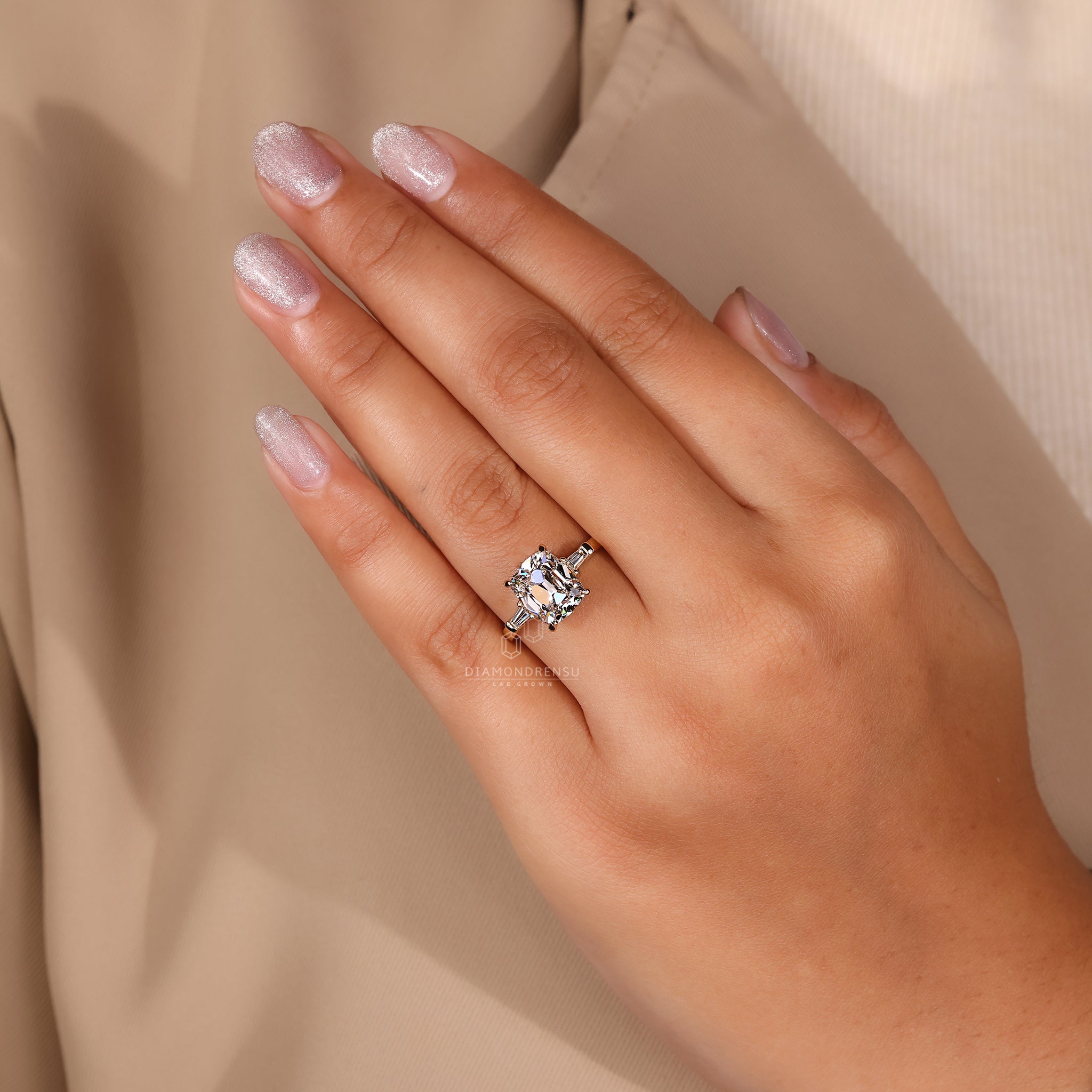 Three stone diamond ring with basket setting.
