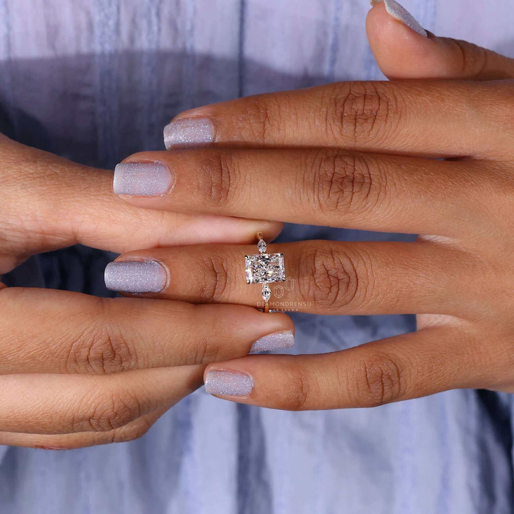 Marquise diamond ring with a radiant cut diamond, crafted as a unique engagement ring for UK traditions.
