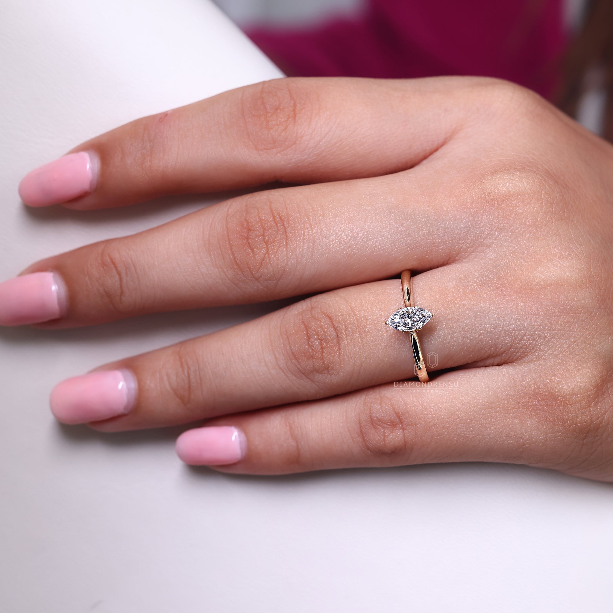 Cathedral setting ring crafted in yellow gold.

