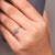 4 claw prong ring holding a bright diamond securely.
