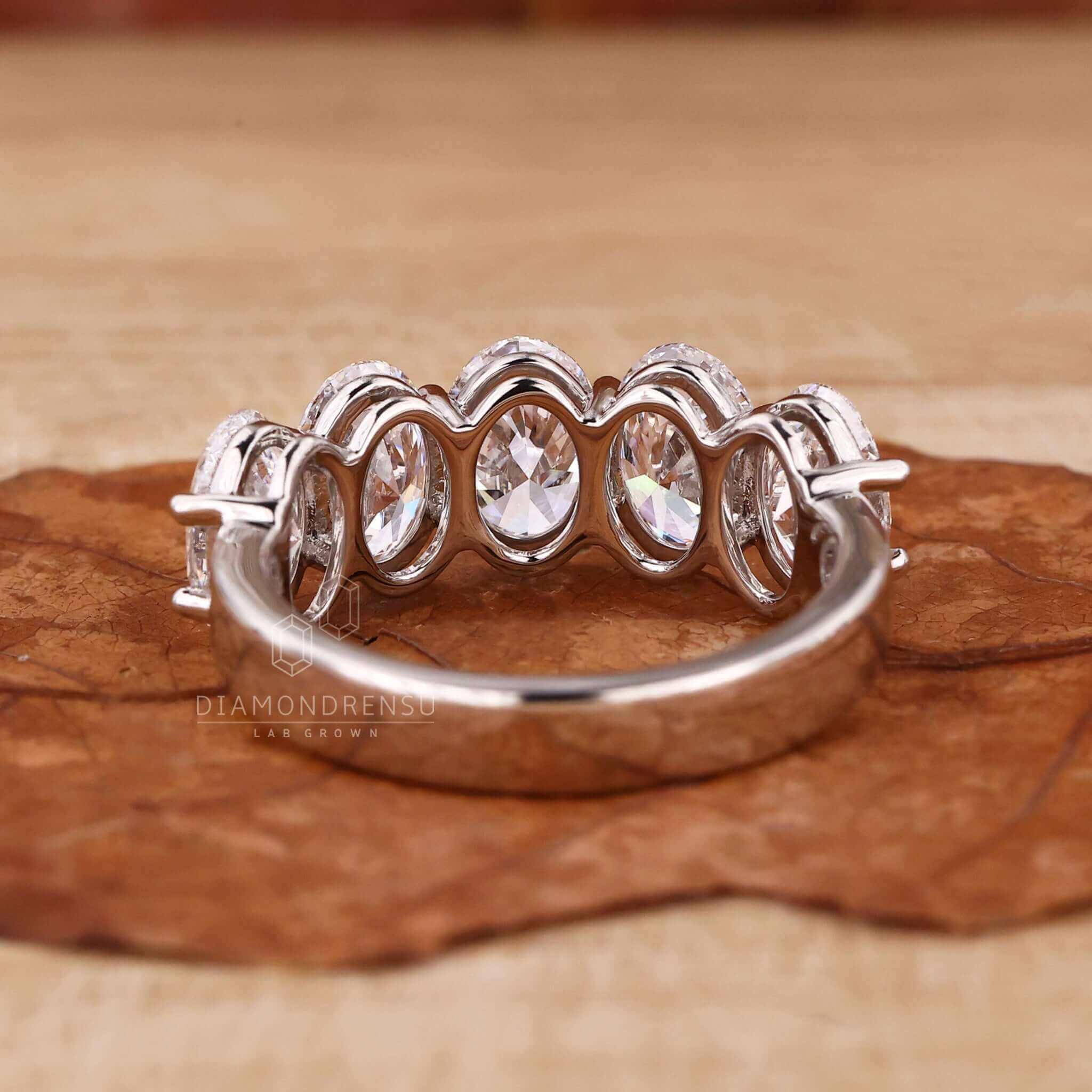 Oval diamond ring gold band crafted for a modern and sophisticated look.