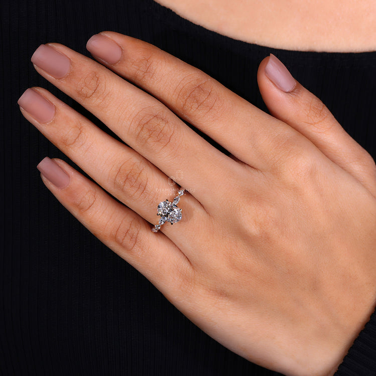 Marquise and round side stones
