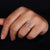 Compass prong setting with marquise diamond.
