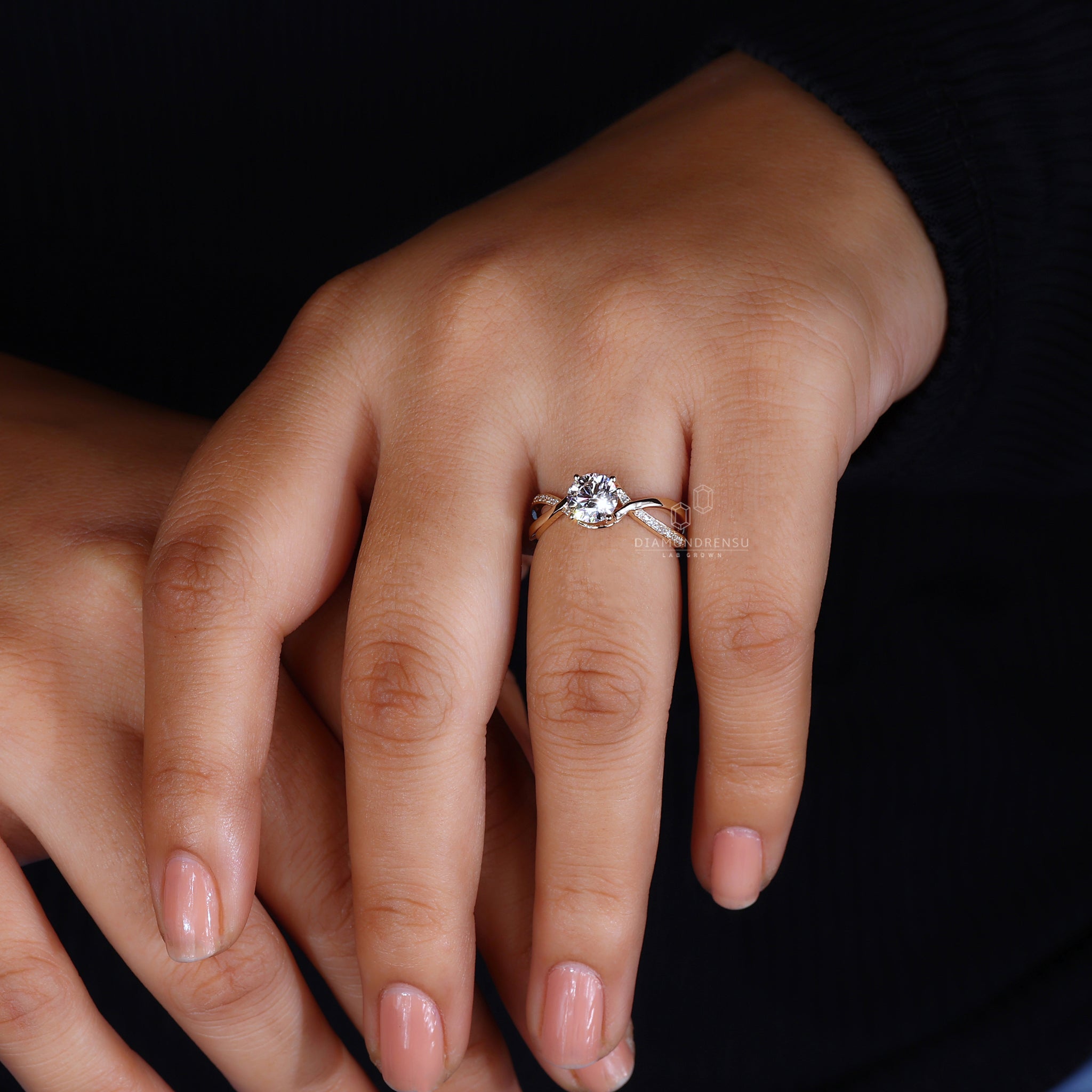 Custom engagement ring with twisted band.
