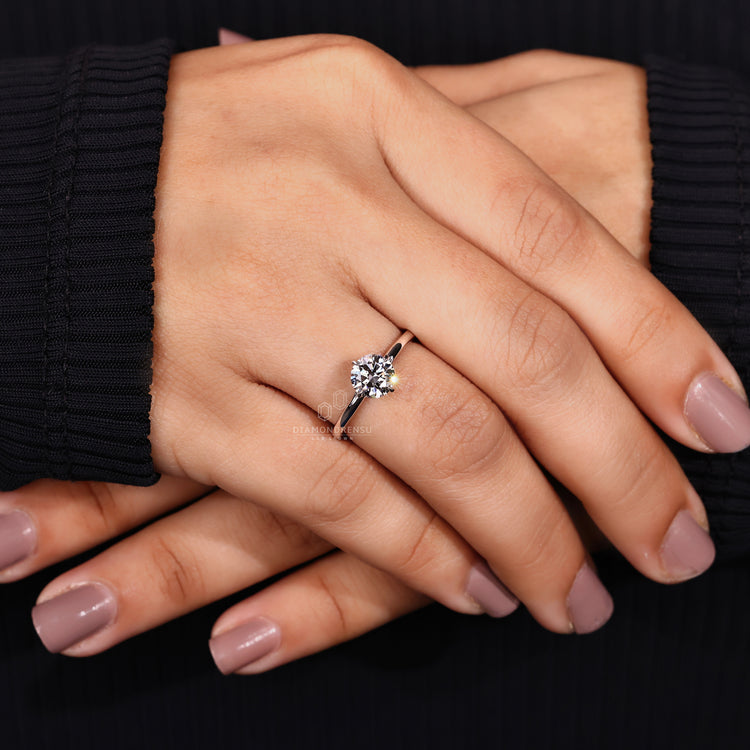 Buy engagement ring featuring round diamond engagement ring.
