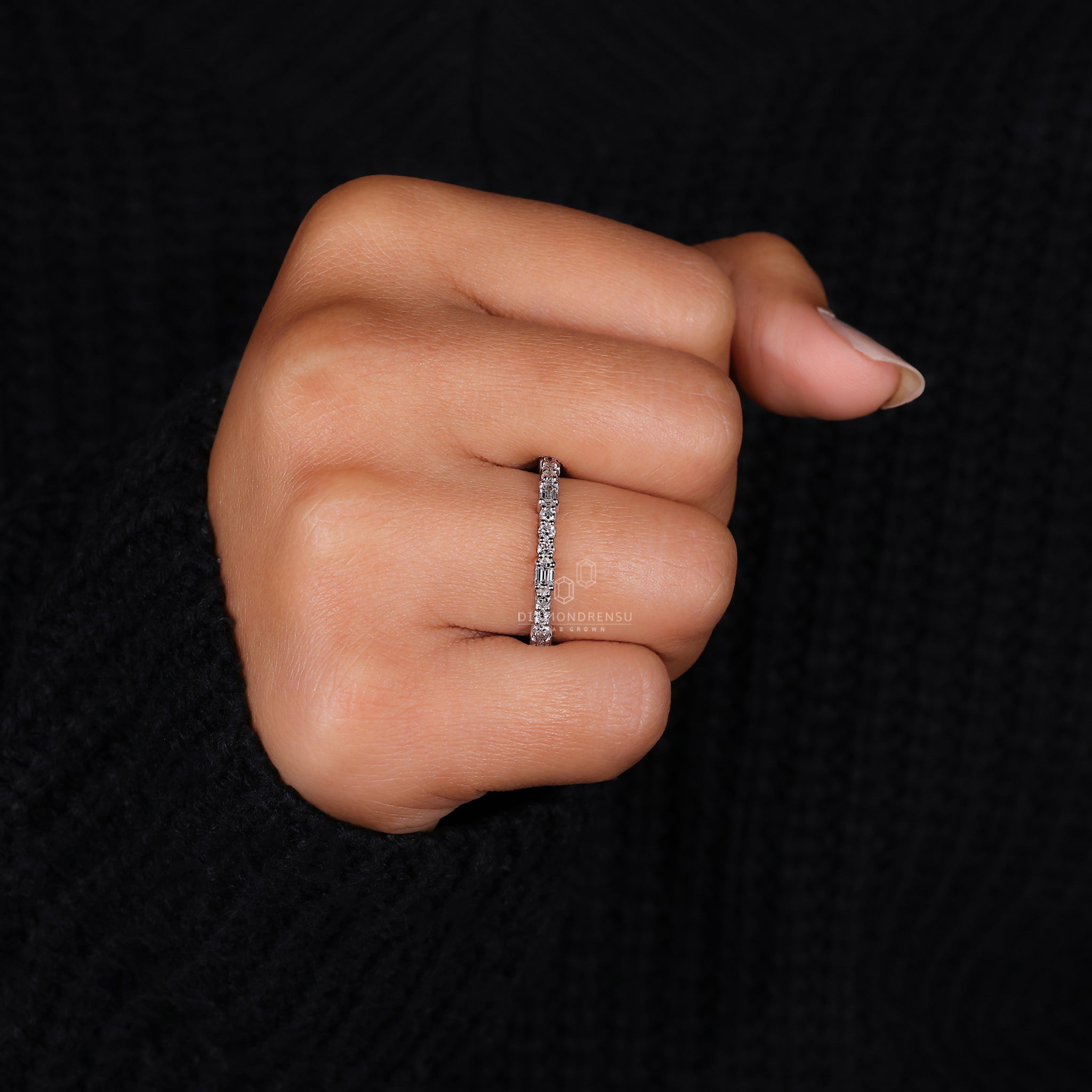 Lab diamond wedding band with emerald cut diamonds.
