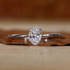 Oval solitaire engagement ring in white gold.
