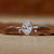 Oval solitaire engagement ring in white gold.
