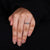 Round solitaire ring crafted as round diamond engagement ring.
