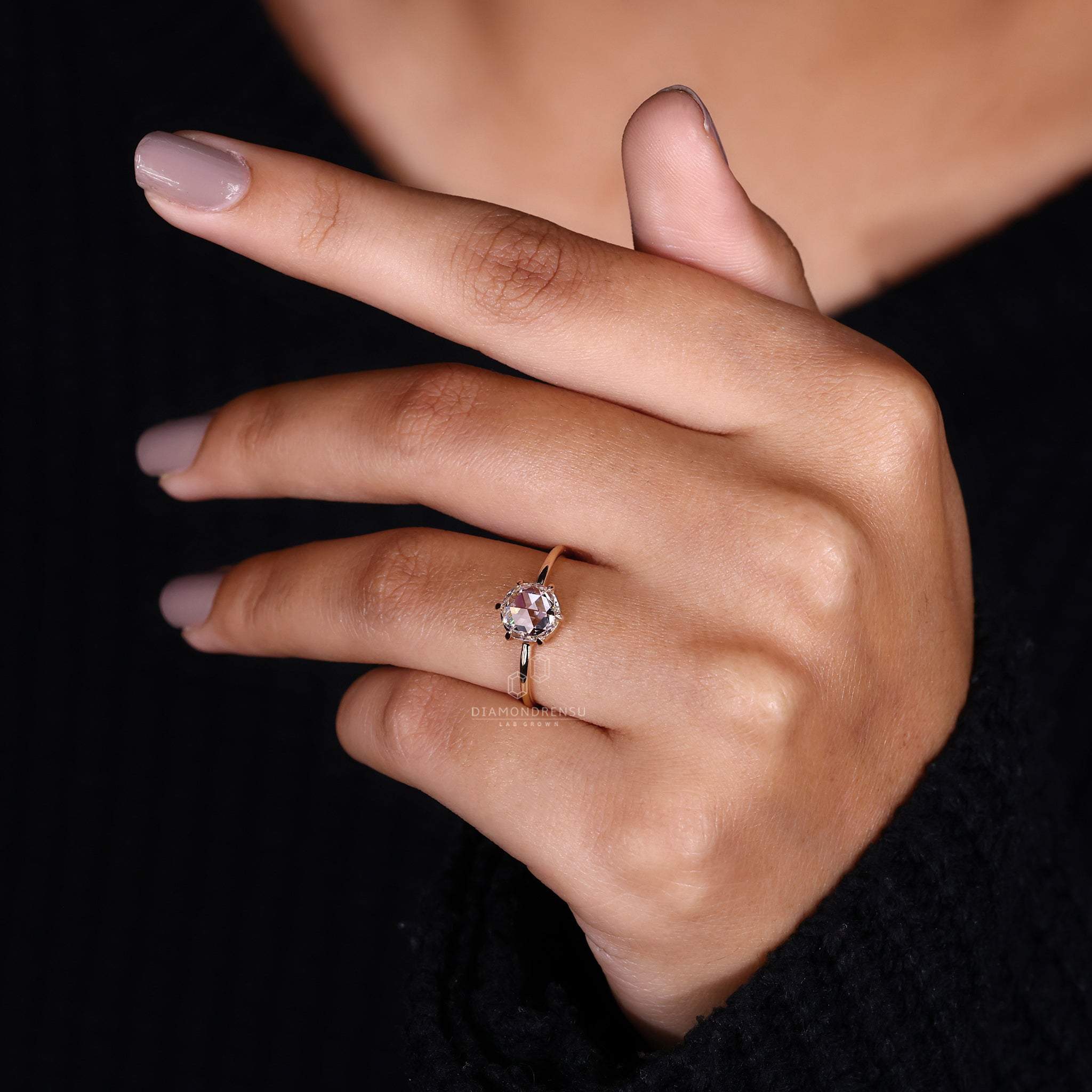 Elegant rose cut diamond in a handmade solitaire design.
