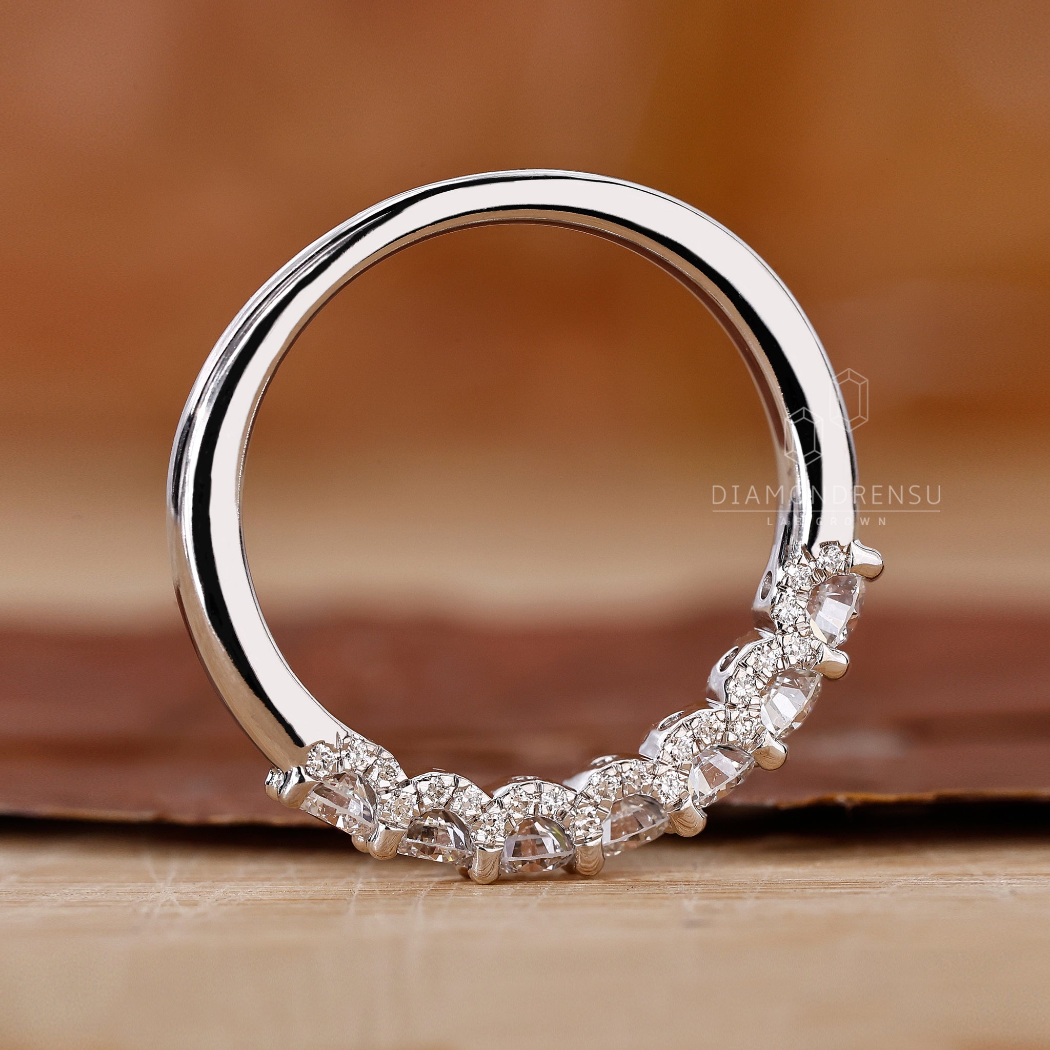 Hidden pave round diamond wedding band.
