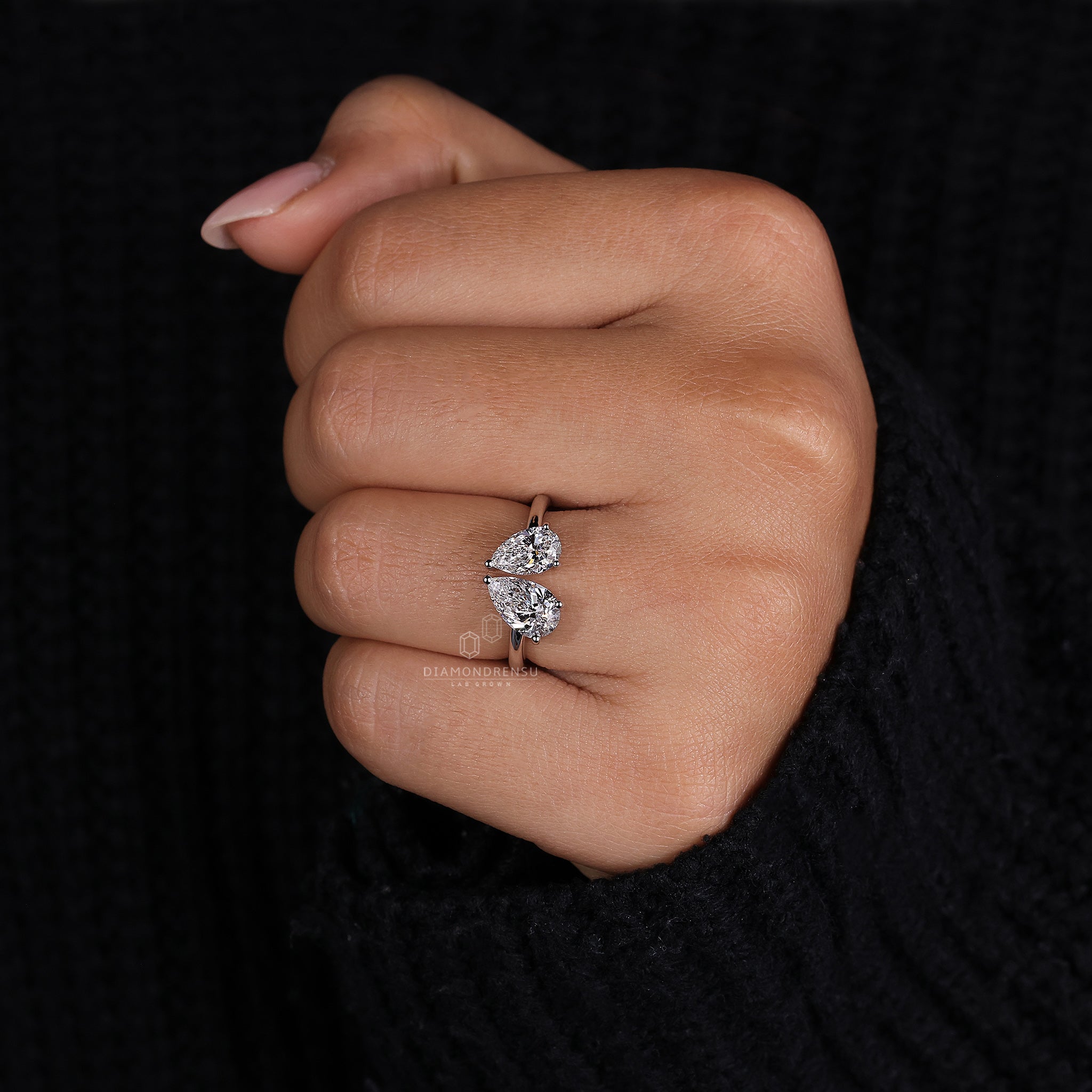 Lab diamond ring with Toi et Moi design and three prong setting.
