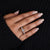 Prong setting ring in yellow gold with a round cut diamond.

