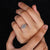 Tapered baguette cut ring and trapezoid cut ring are set in 5 stone ring design.
