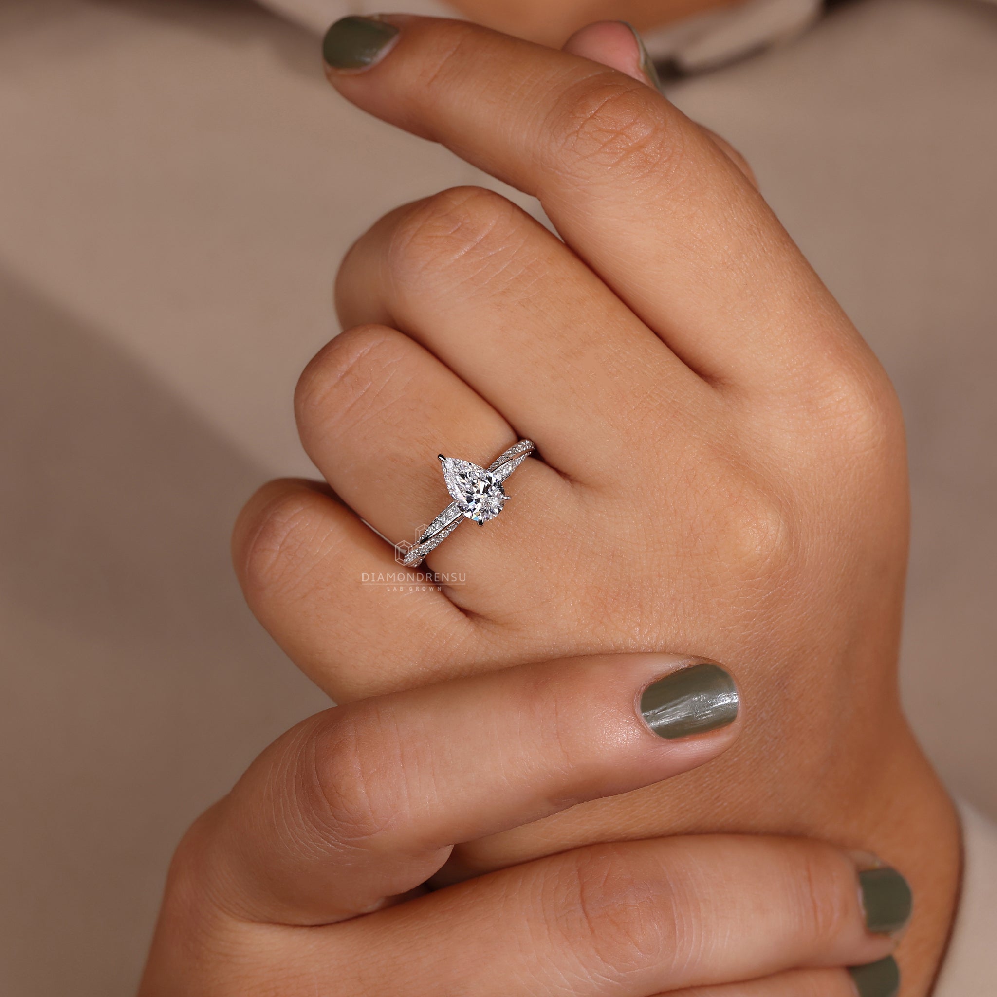 White gold ring featuring a sparkling lab grown diamond.