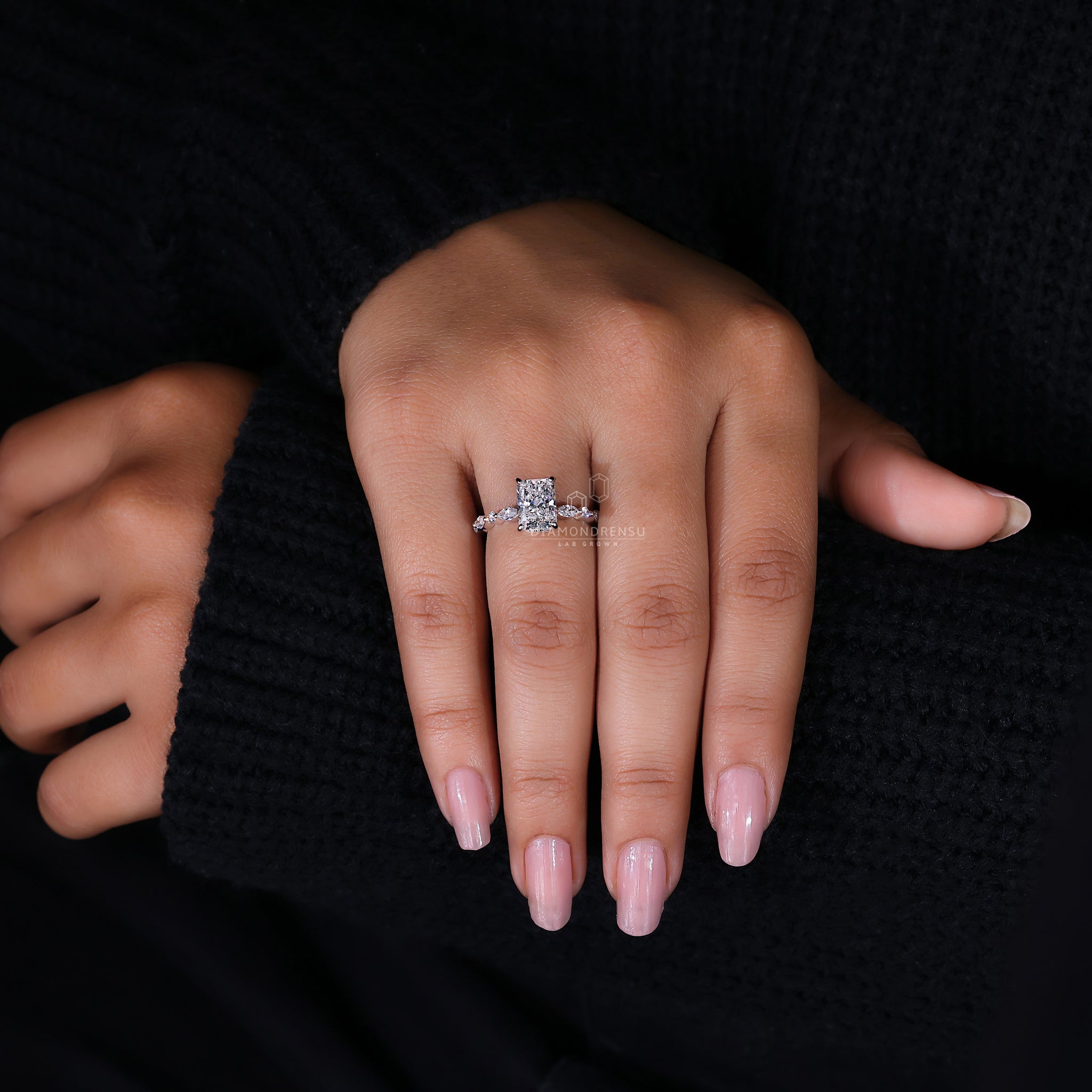 Round Cut Halo Ring featuring a shared prong setting.
