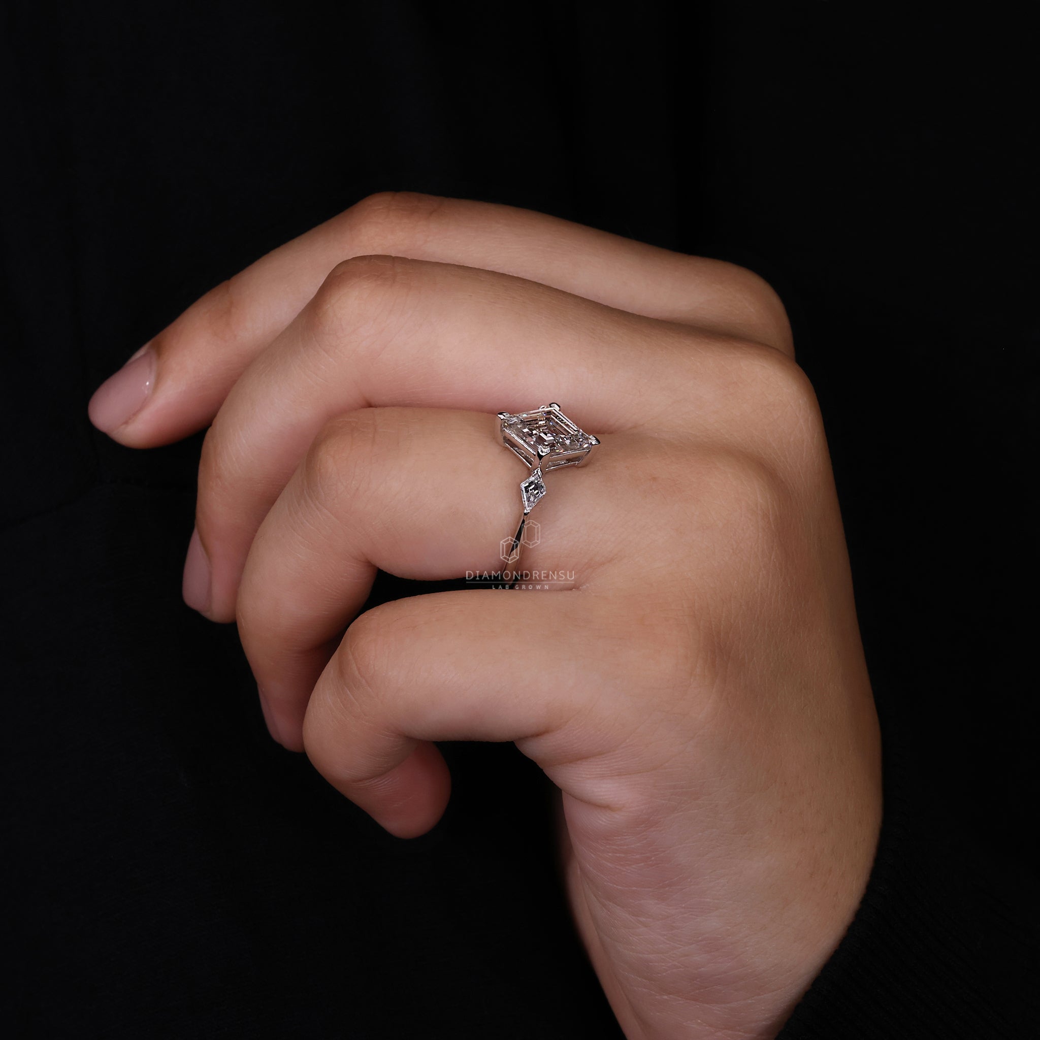 Engagement ring white gold styled as 3 stone engagement ring.
