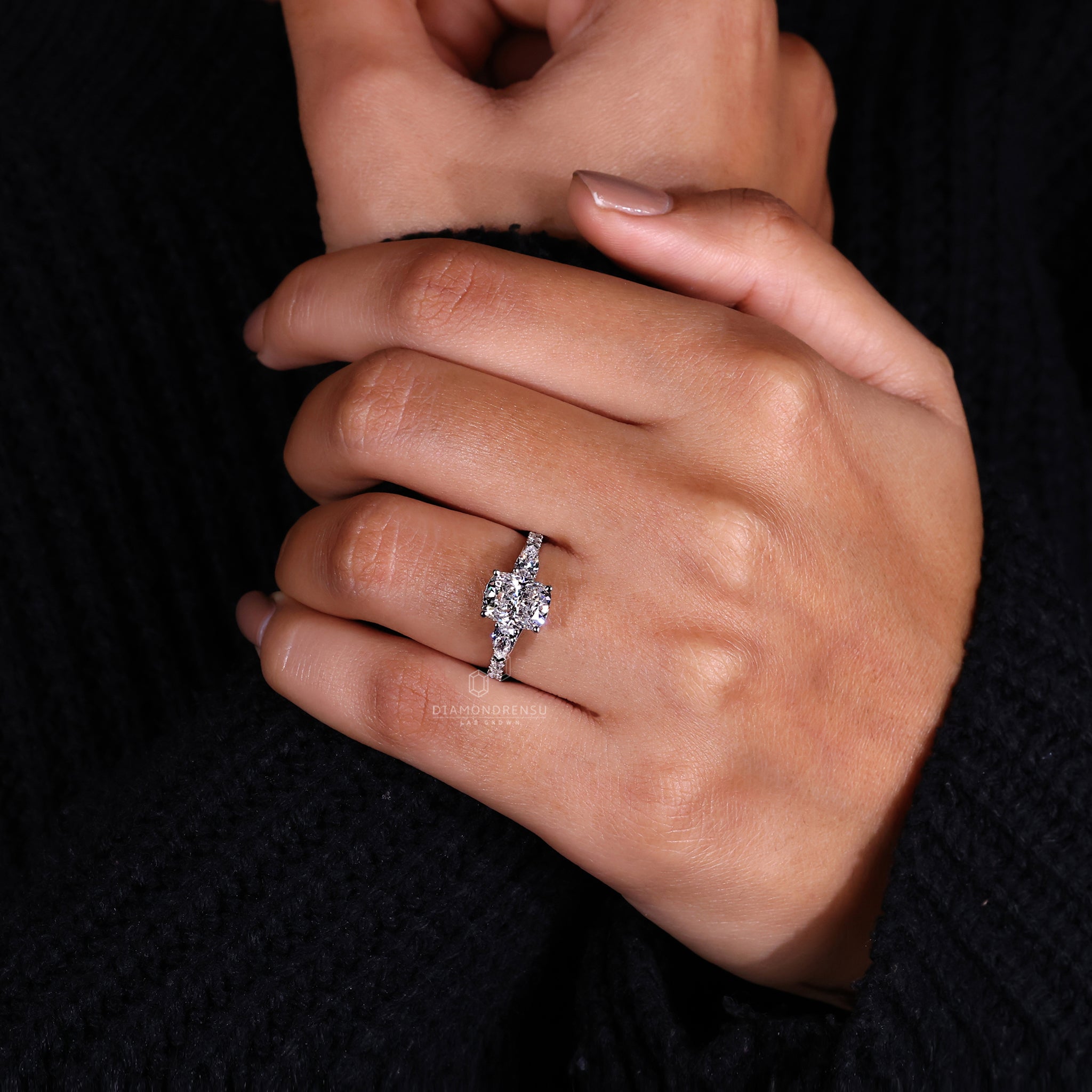 Hidden halo ring featuring pave setting ring
