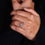 Hidden halo ring featuring pave setting ring
