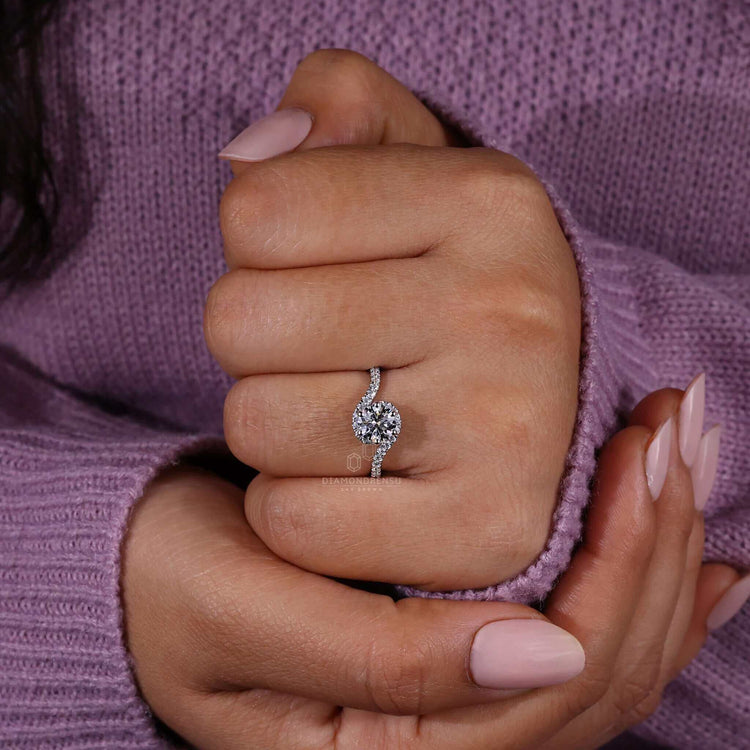 Round cut diamond in a six prong engagement ring, ideal for timeless beauty and unmatched brilliance.