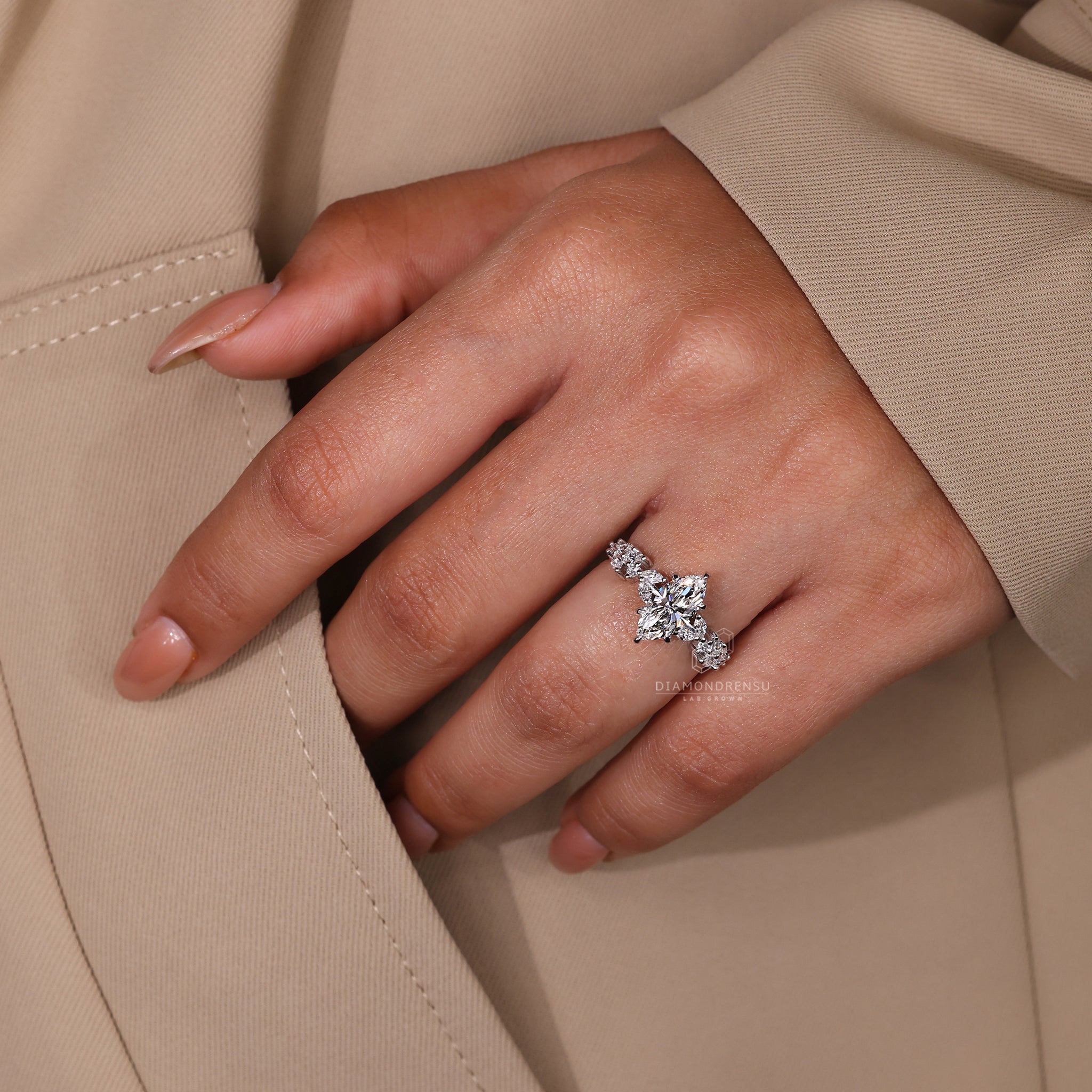 Diamondrensu UK engagement ring with zigzag pave set and prong design.

