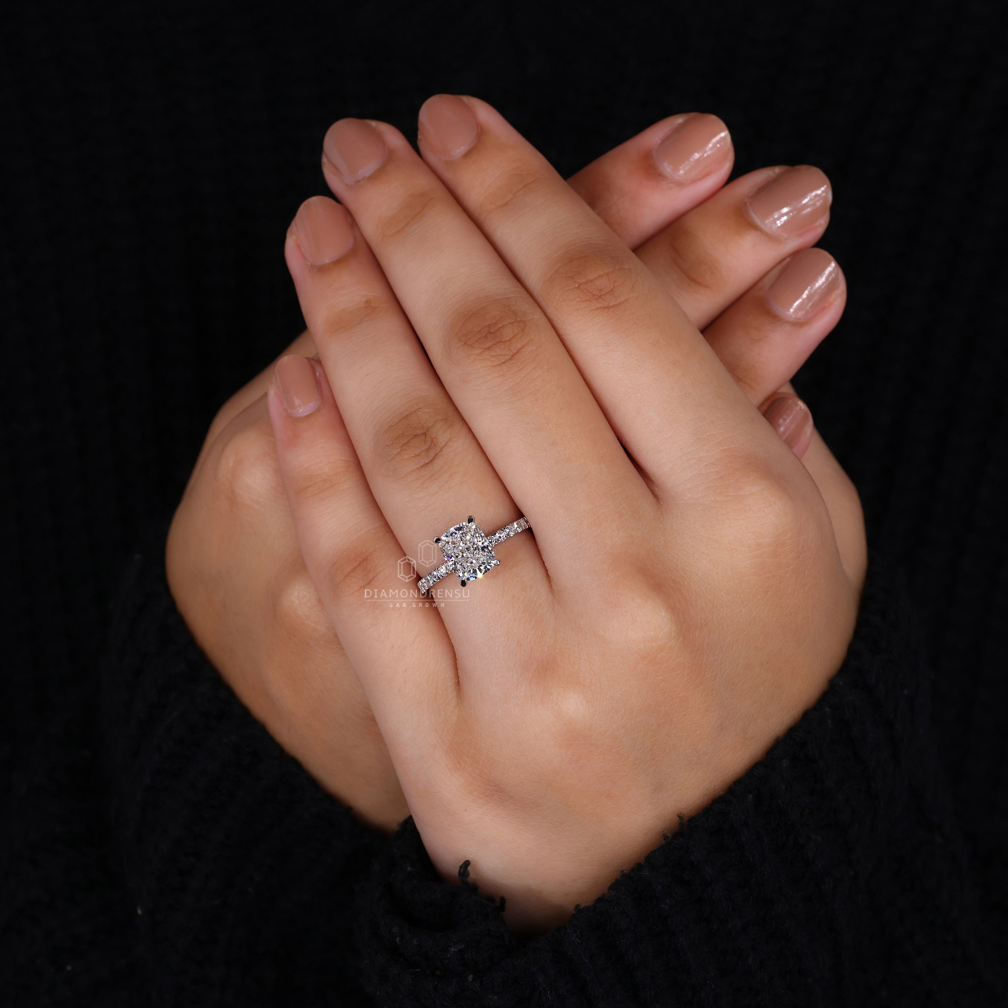 Buy engagement ring with IGI certified round diamond and pave setting.
