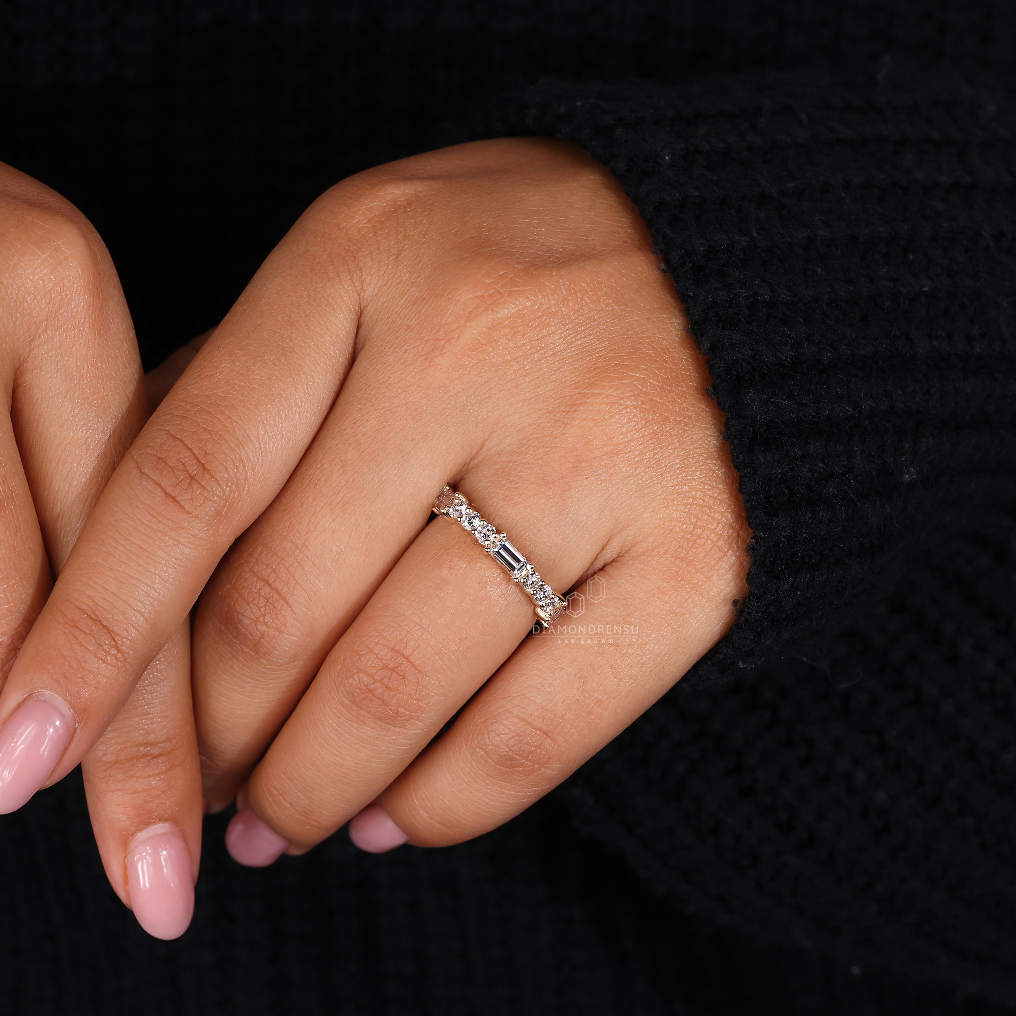 Round diamond wedding band with baguette style
