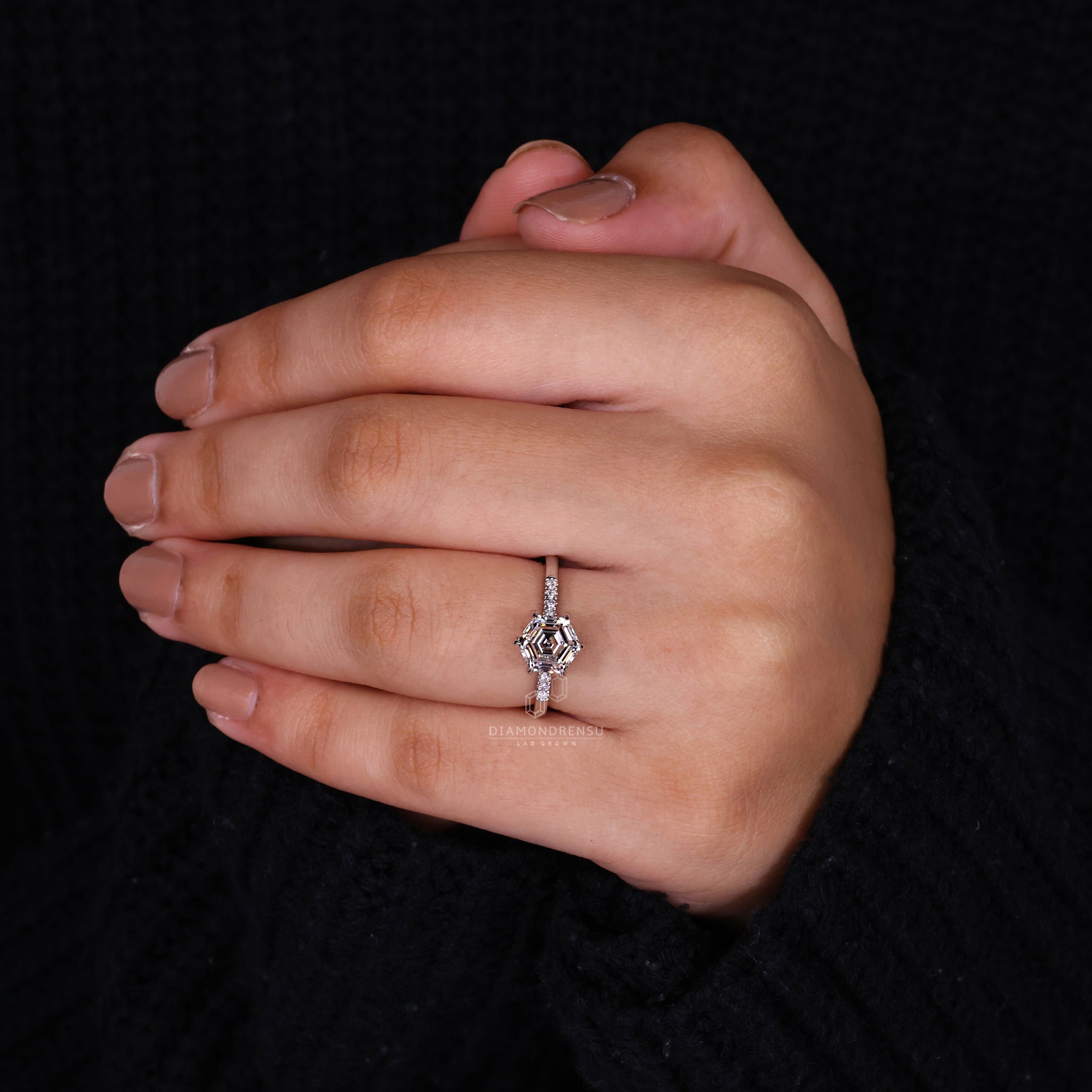 Pave setting ring secured with 6 claw prong setting.
