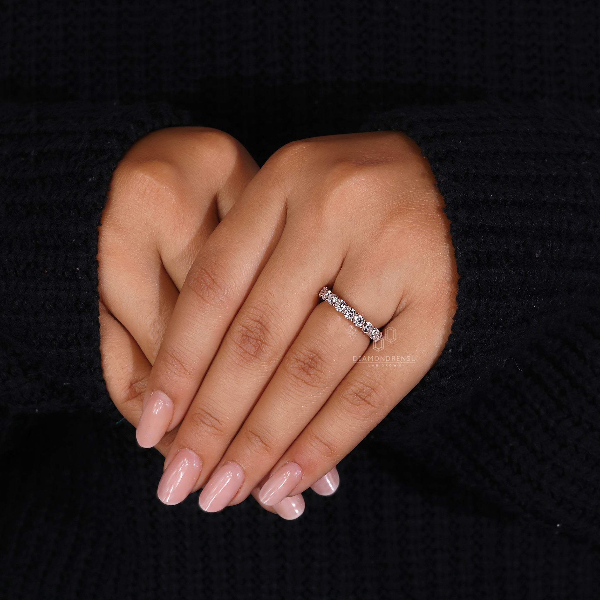 Rose gold wedding band with prong setting

