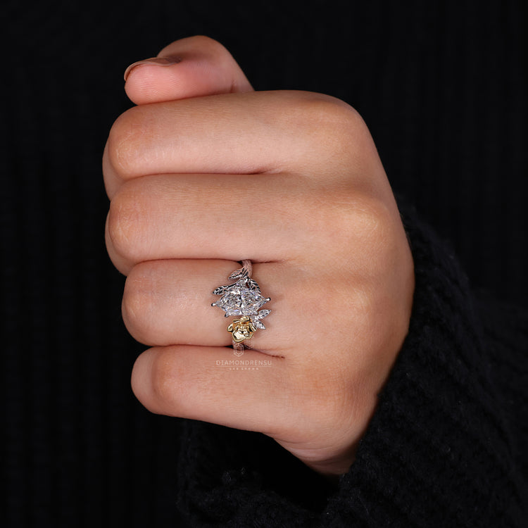 Buy engagement ring with dutch marquise and round side accents.
