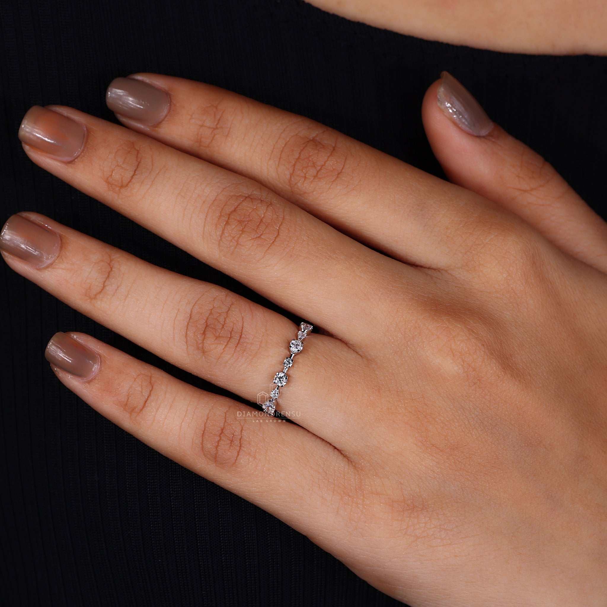 White gold distance pave eternity diamond wedding band
