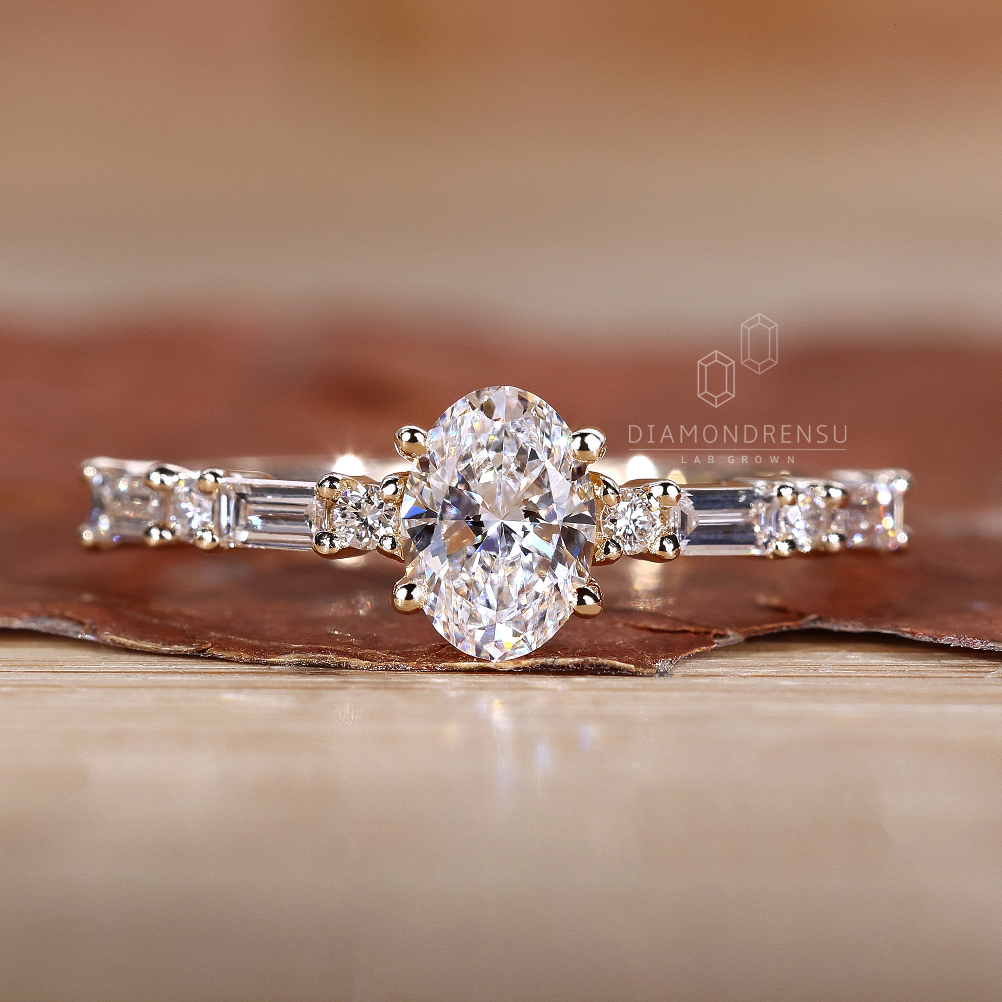 UK engagement ring with baguette side stones.
