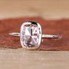 Bezel set engagement ring with a stunning rose cut diamond.