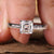 Asscher Cut Diamond Ring with intricate channel set design.