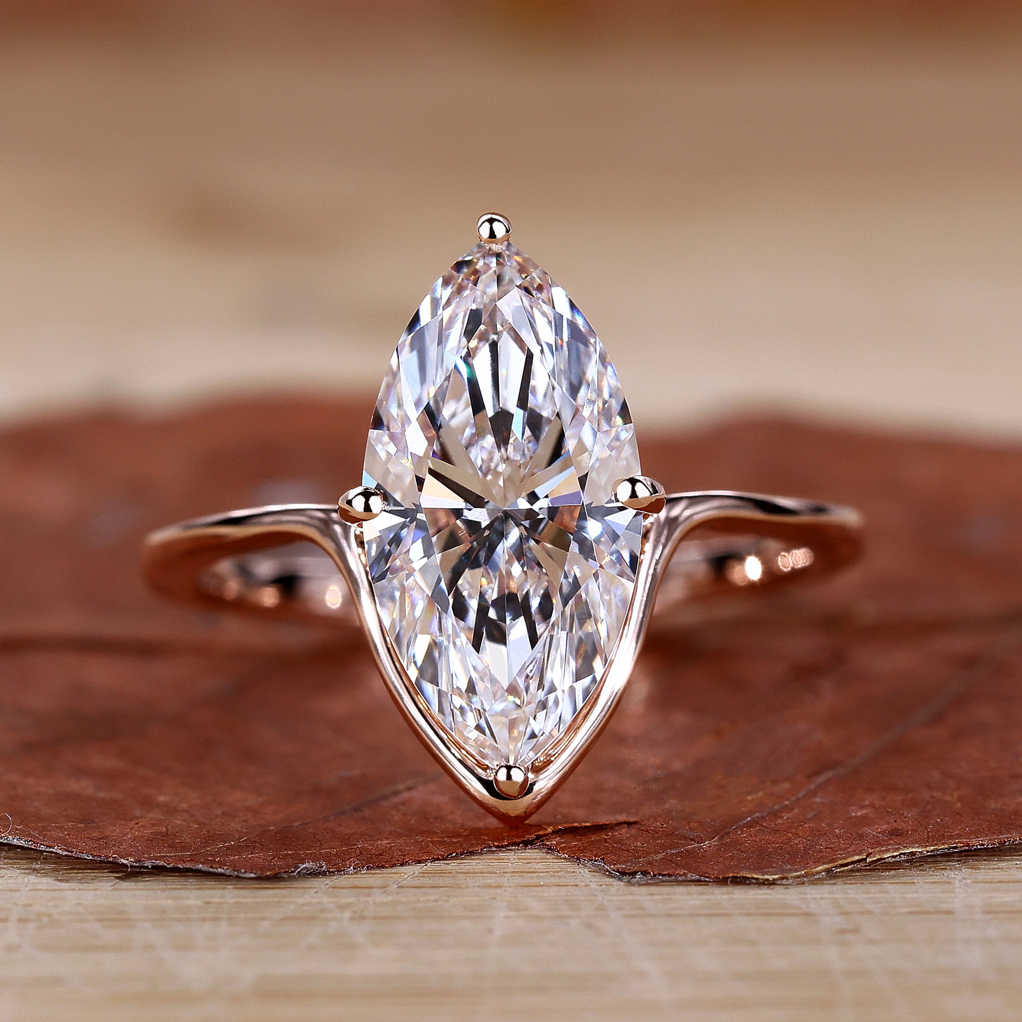 Marquise diamond engagement ring set in a sleek design.

