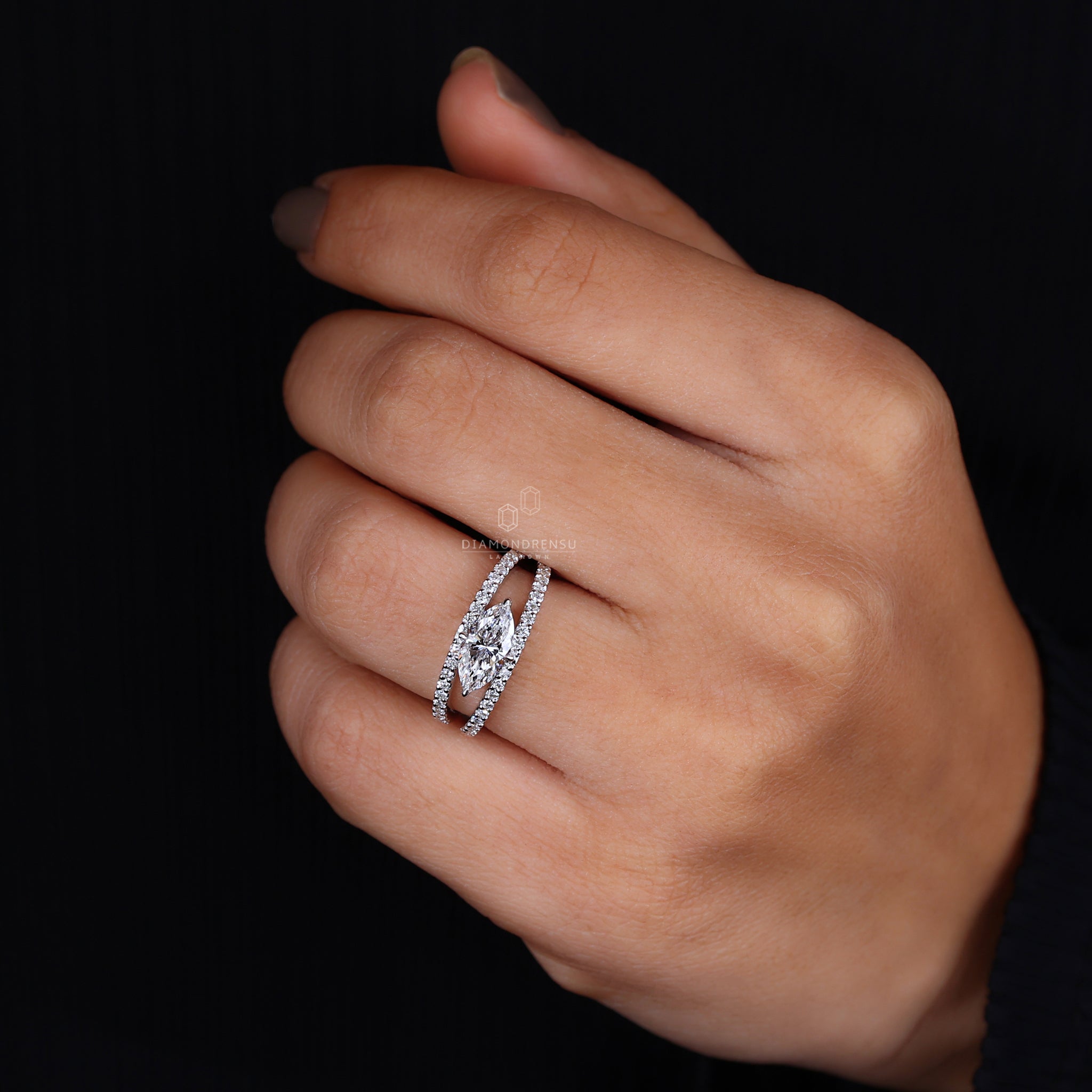 Round cut pave set diamonds on white gold.
