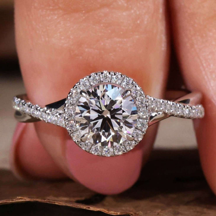 Twisted engagement ring featuring a round diamond for elegance.

