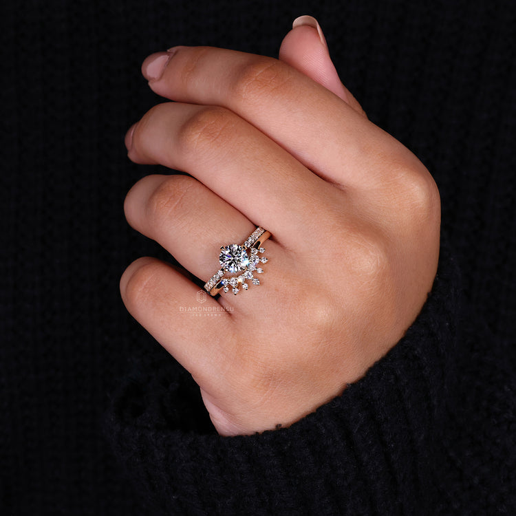Round diamond ring paired with prong set wedding band in handmade jewellery.
