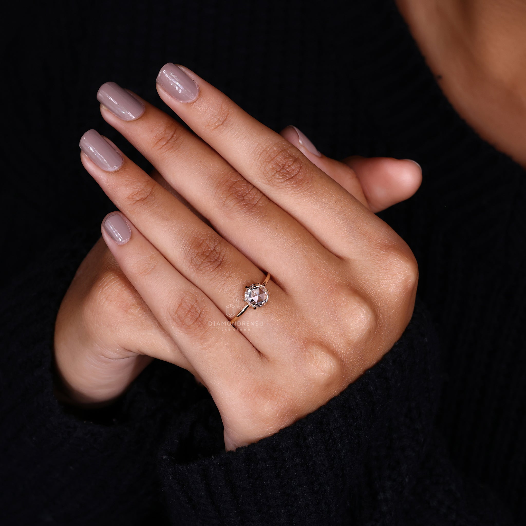 Simple engagement ring featuring a lab grown diamond.
