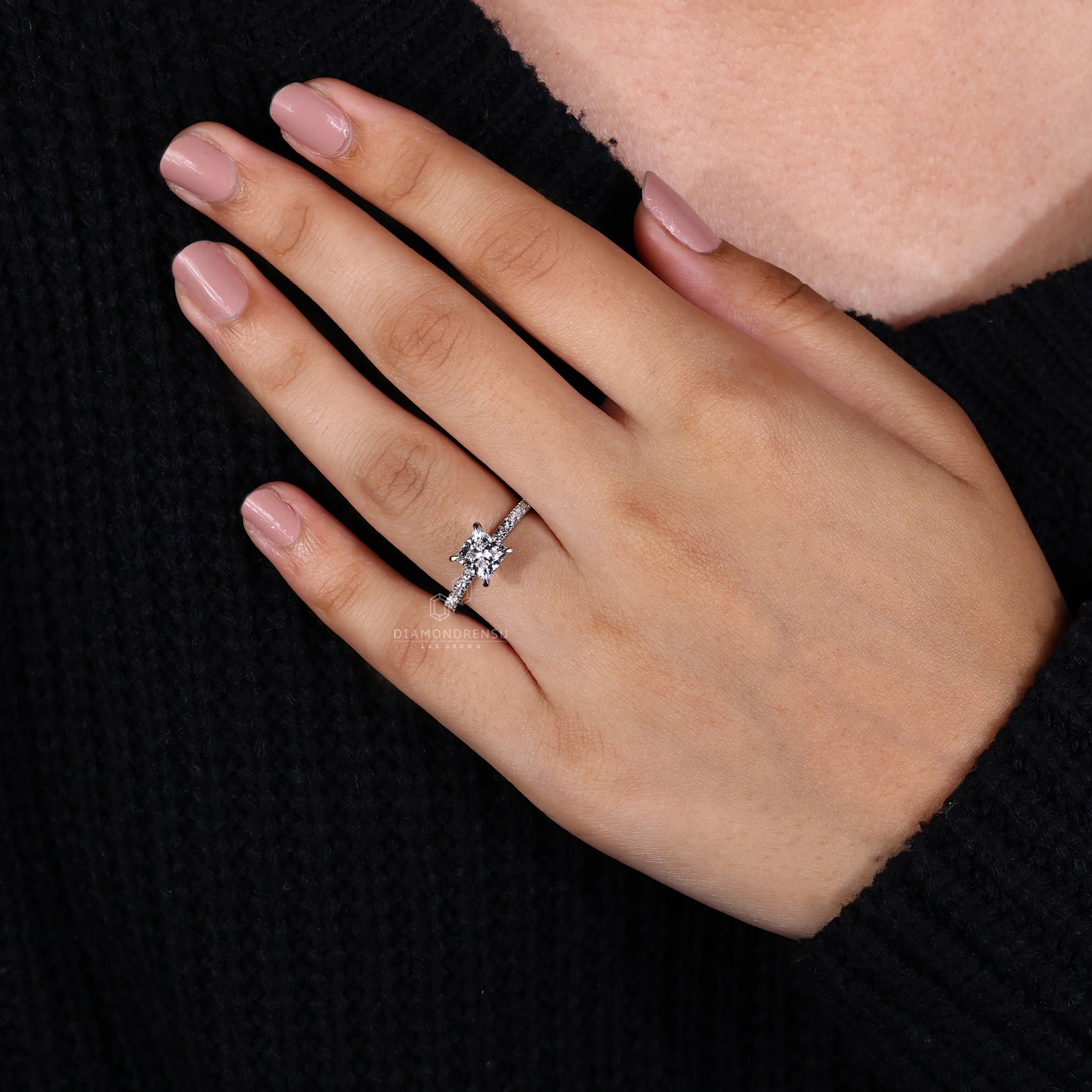 Buy diamond ring with princess cut and pave details.
