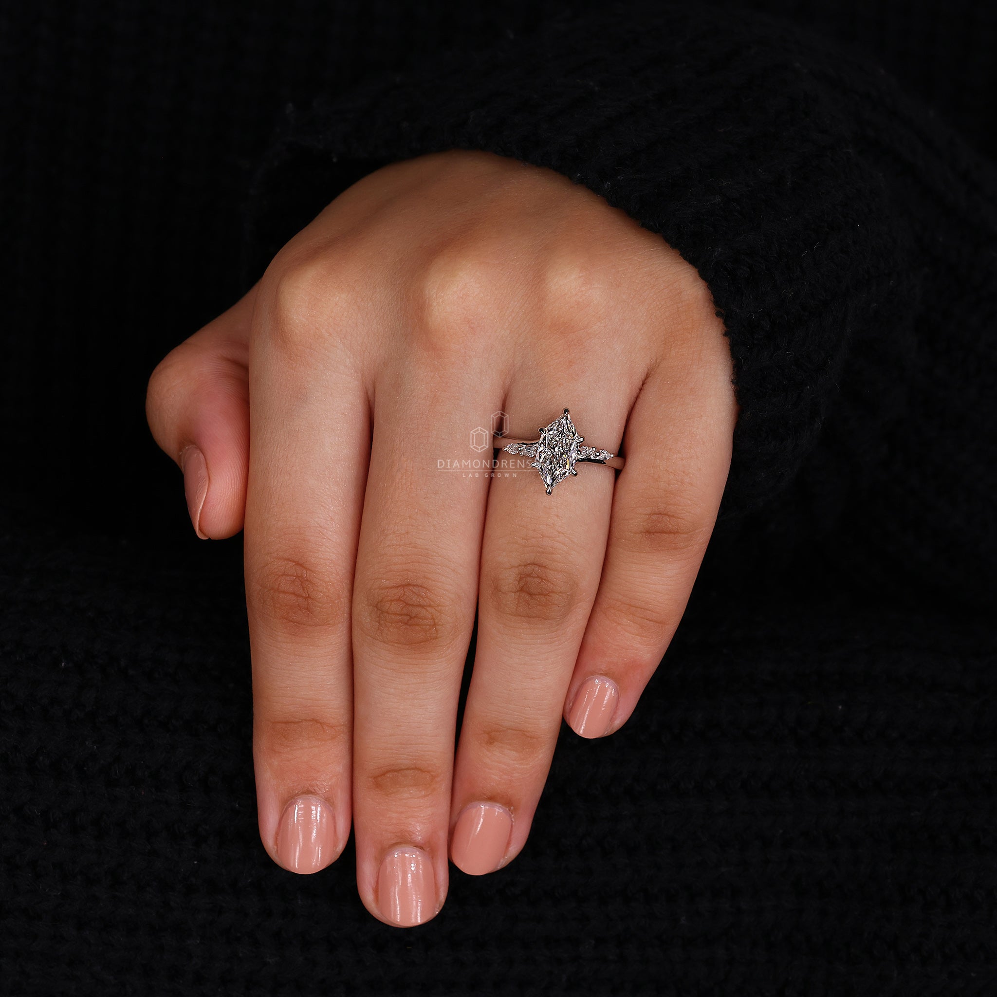 UK engagement ring with bridge accent ring setting.
