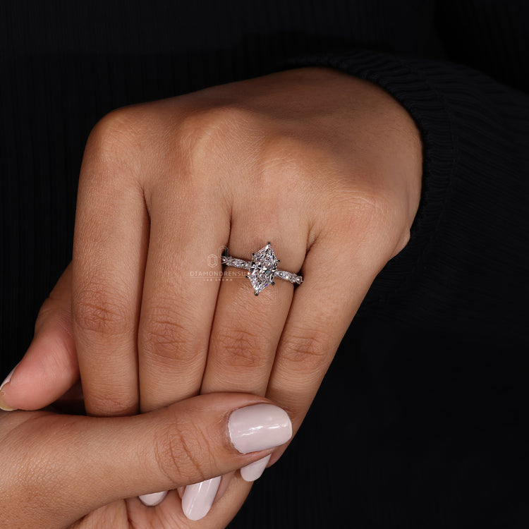 UK engagement ring designed with milgrain setting.
