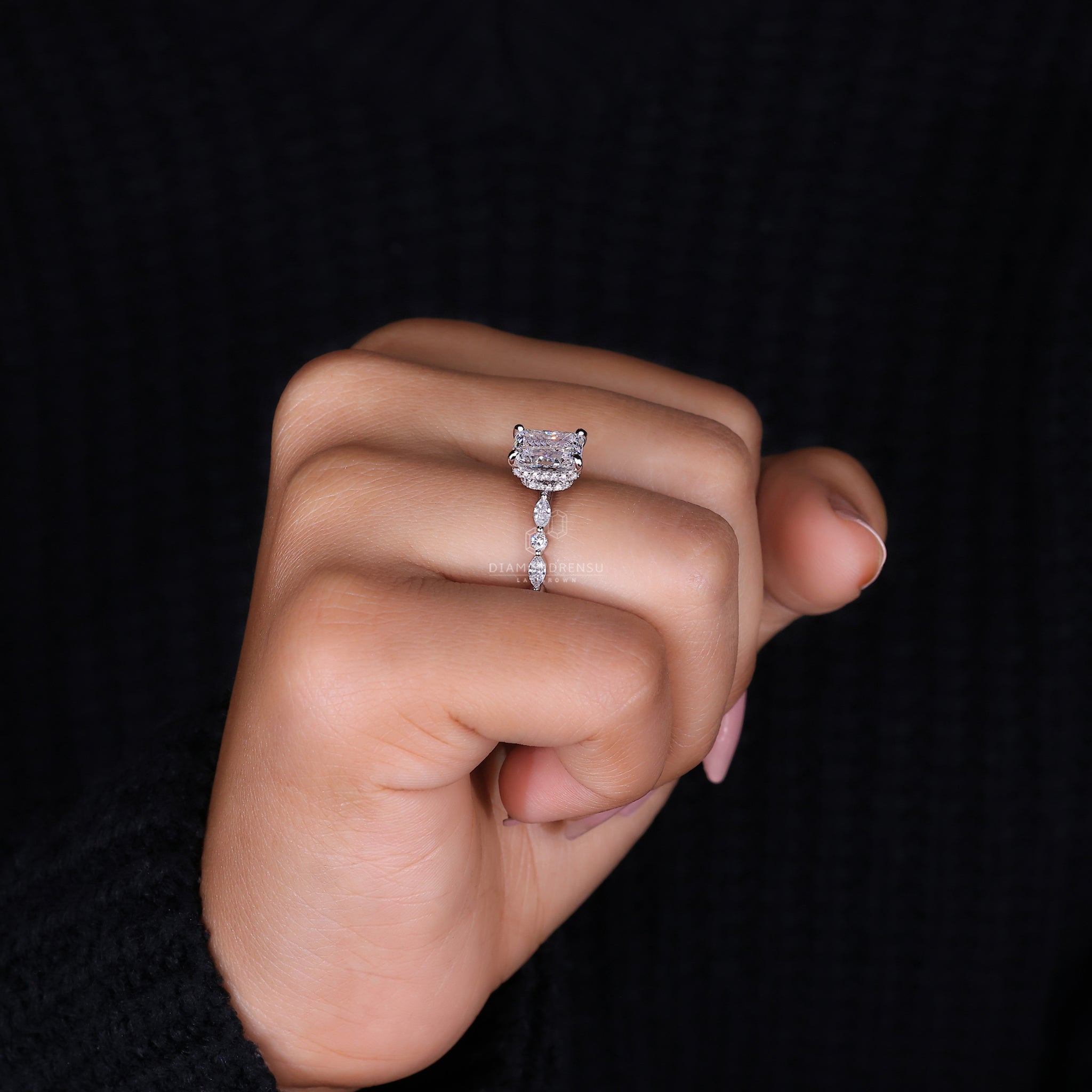 Marquise and Round Diamond Ring with elegant design.
