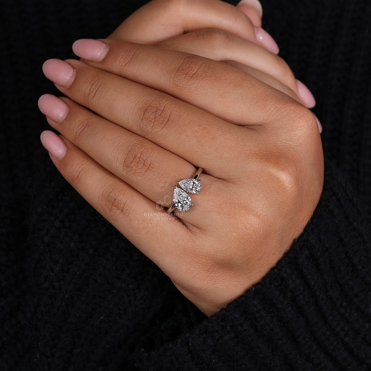 UK engagement ring with Toi et Moi diamond design and custom setting.
